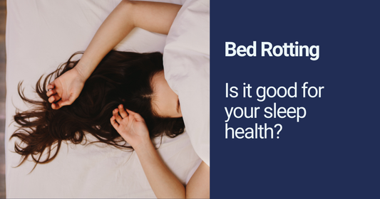 Person lying in bed, partially covered by a blanket, with text asking 'Is bed rotting good for your sleep health?