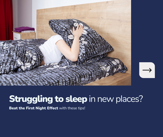 Young woman unable to sleep, covering her head with a pillow in a modern bedroom, featured in an article about combating the first night effect for better sleep in unfamiliar environments.