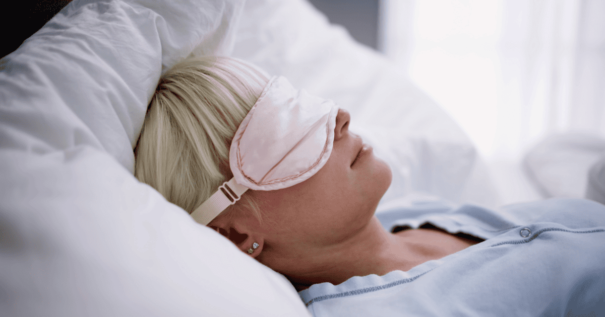 Young women sleeping with sleep mask